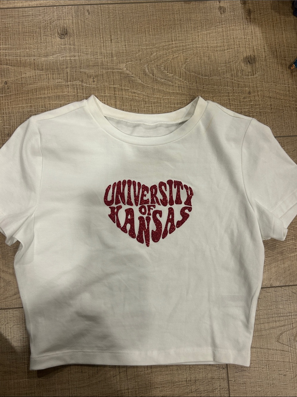 University of Kansas White Cropped Tee with Red Heart Graphic